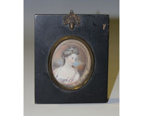 British School - Oval Miniature Portrait of a Young Lady, 19th century watercolour on ivory, 6cm x 4.5cm, within an ebonized 