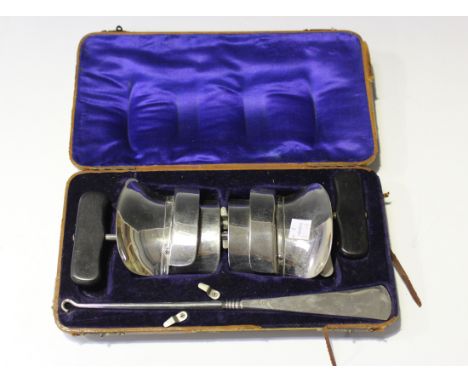 A late 19th/early 20th century chromium plated hunting accoutrements set by Peal & Co, Oxford St, the brown leather case encl