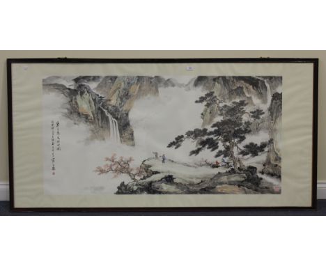 A 20th century Chinese watercolour, painted with an expansive mountainous landscape depicting figures standing and seated on 