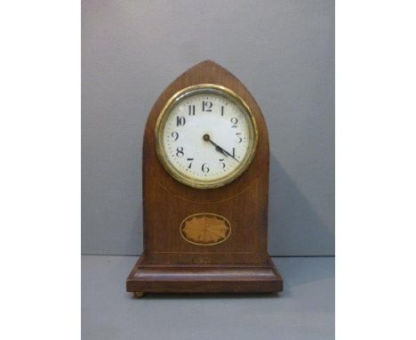 An Edwardian inlaid mahogany gothic design mantle clock.