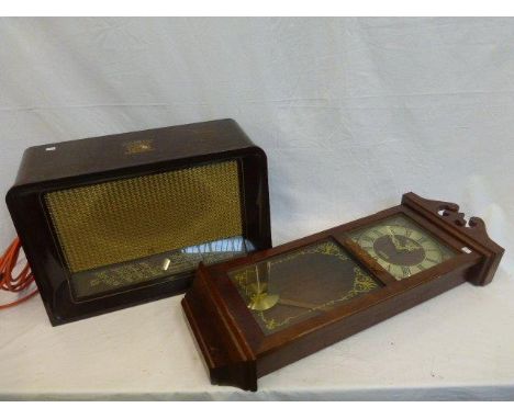 A mahogany-cased wall clock and a 1940s 'His Master's Voice' radiogram.