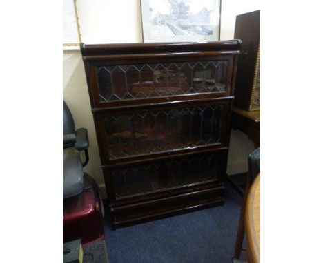 A Globe Wernicke three stack bookcase with lattice glazing.