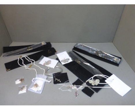A silver bangle stamped 925, three Quartz ladies wristwatches, a matching seed pearl necklace and bracelet and an assortment 