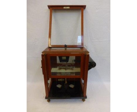 A mahogany cased Releas-O-Matic fine balanced scales, by L Oertling, London, model no. 141, serial no. 42029