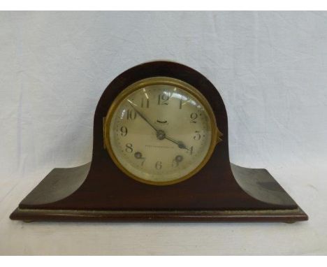 A mahogany cased dome topped mantle clock inscribed Henry Birks & Sons Ltd. to the dial. 