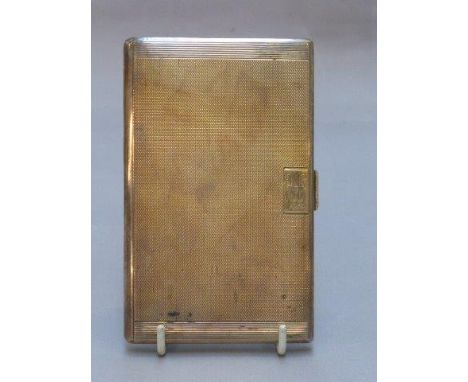 A silver cigarette case with engine turned decoration, maker Deakin & Francis Ltd., Birmingham 1939. 