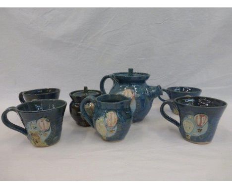 A stoneware four-setting tea service celebrating the 41st Irish balloon championship.