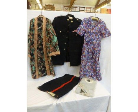 An assortment of early 20th Century clothing and later items, including a policeman's dress uniform with medal ribbons, in a 