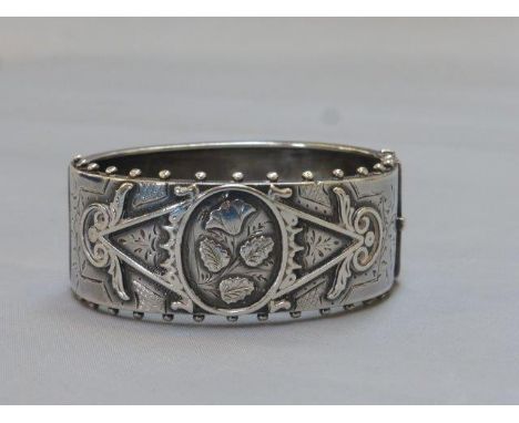 A silver bangle, maker WF Birmingham 1964.