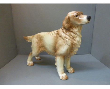 A large Goebel pottery model of a standing golden retriever.