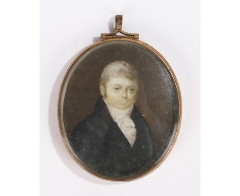 George III miniature portrait, of a gentleman with white hair above a white ruff and deep blue jacket, oil on ivory, 63mm dia