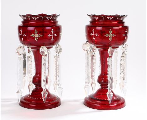 Pair of 19th century ruby glass candle lustres, with enamel foliate decoration to the bowls with hanging clear glass prismati