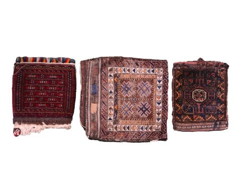 Three carpet camel bags, the largest 66cm x 72cm (3)Surface fraying and fading, some splits to edges