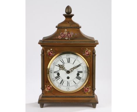 Chinoiserie gilt and foliate cased musical mantle clock, the egg form finial above a down-swept pediment, the white dial with