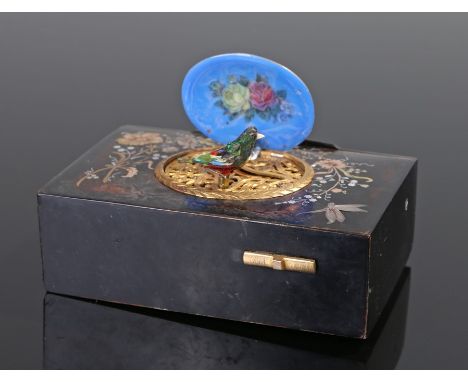 Fine 19th Century tortoiseshell pique work and enamel Swiss music box, the enamel flip over lid with a decorated scene openin