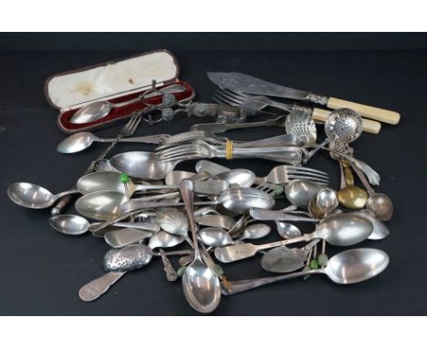 A collection of mixed cutlery to include fully hallmarked sterling silver and silver plated examples. 