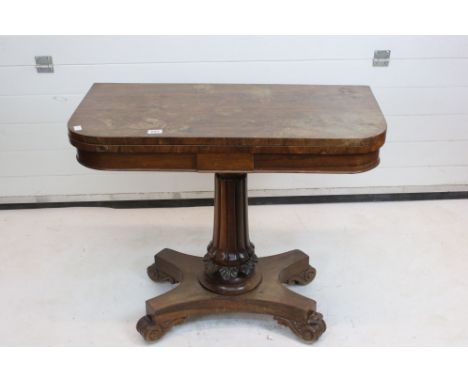 Regency / William IV Rosewood Fold-over Card Table opening to a green baize playing surface, raised on a turned carved fluted