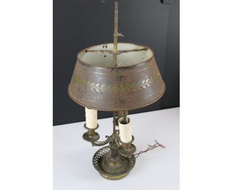 French Brass ' Bouilotte ' Table Lamp with a tole shade, probably late 19th century (losses and damage), 61cm overall height 