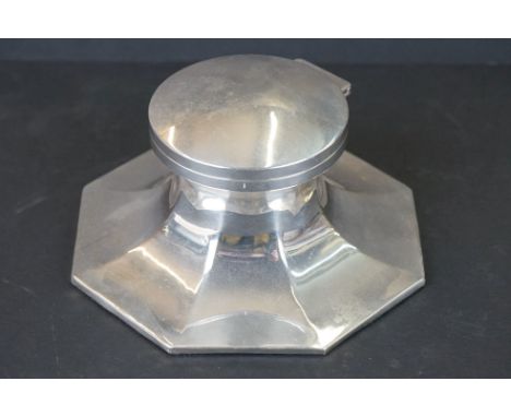 A large fully hallmarked sterling silver captstan inkwell complete with glass ink well. 