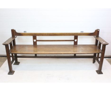 Arts and Crafts / Art Nouveau Oak Hall Bench, the supports pierced carved with hearts, 190cm long x 51cm deep x 80cm high 