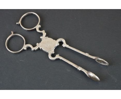 Pair of 18th century Silver Sugar Nips, probably by William Harrison, London initialed ' IM ' 