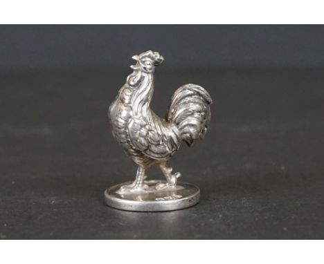 A fully hallmarked sterling silver miniature figure of a cockerel, maker marked for Sampson &amp; Mordon. 