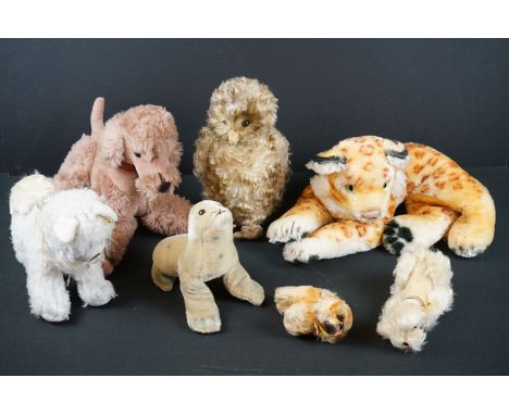 A collection of seven Steiff soft toys to include an owl, poodle and a seal...etc.. 