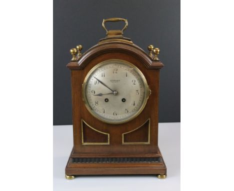 Edwardian Mahogany and Brass Mounted George III style Bracket Clock, the domed top with brass carrying handle and four ball f