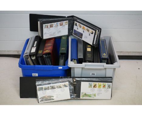 A large collection of first day covers contained within albums. 