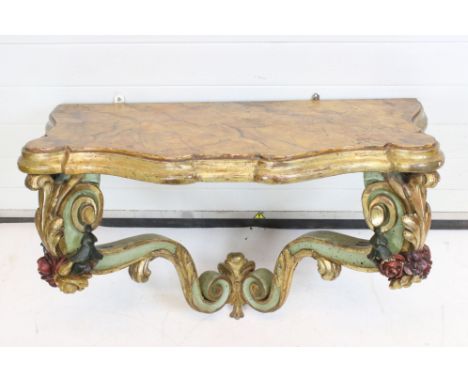 19th century probably Venetian Carved Wooden Bracket / Hanging Console Table, with painted faux marble top and two floral car