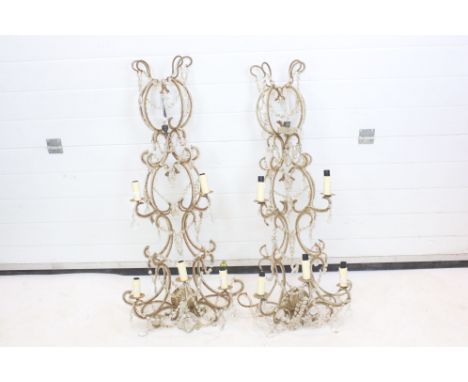 Pair of Three Tier Five Branch Wall Light Fittings, the scrolling gilt metal brackets adorned with crystal drops, 107cm high 