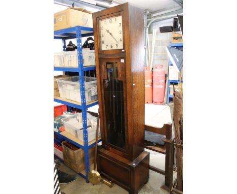 Art Deco Oak Longcase Clock, the square case holding a silvered dial with Arabic numerals, the trunk with clear glazed door, 