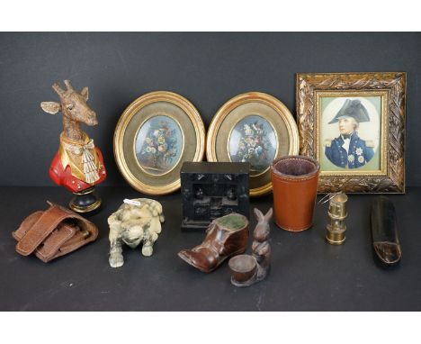 A box of mixed collectables to include a wooden pin cushion in the form of a boot, a miniature miners lamp and a leather dice