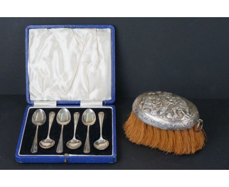 A dutch fully hallmarked silver topped clothes brush together with a cased set of six fully hallmarked sterling silver teaspo