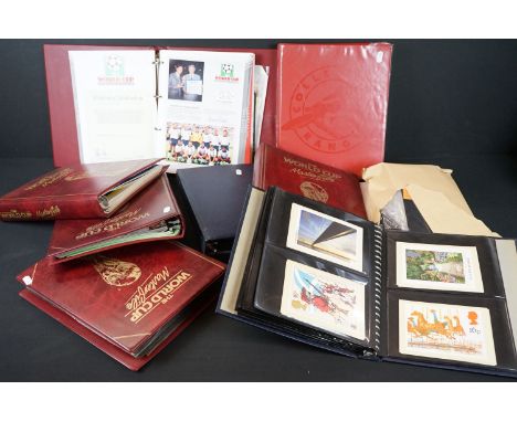 A collection of mixed stamps, first day covers and Royal Mail stamp postcards contained within albums 