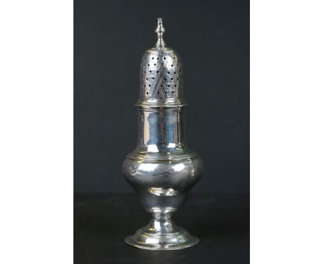A fully hallmarked sterling silver sugar shaker, assay marked for London. 