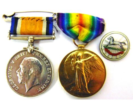 A GREAT WAR PAIR OF MEDALS TO PRIVATE W.T. SMIDDY, WEST YORKSHIRE REGIMENT  comprising the British War Medal 1914-20 and Vict