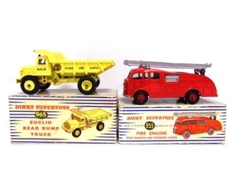 TWO DINKY DIECAST MODEL VEHICLES  comprising a No.965, Euclid Rear Dump Truck, pale yellow with matching hubs, good condition