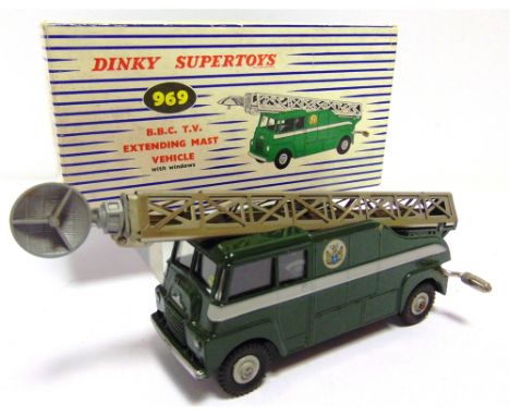 A DINKY NO.969, B.B.C. T.V. EXTENDING MAST VEHICLE  dark green with a grey stripe and grey ridged hubs, near mint, boxed, com