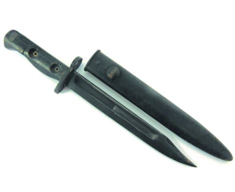 A POST SECOND WORLD WAR BRITISH L1A3 BAYONET  the 20cm blade stamped at the ricasso 'B59', the grip stamped with NATO stores 