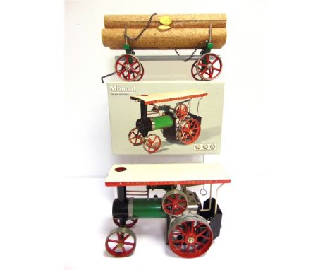A MAMOD NO.TE1A, STEAM TRACTOR  green, white and red, generally good condition, boxed; together with a Log Trailer, green and