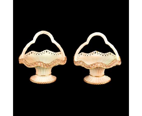 Pair of Royal Worcester Porcelain Baskets. Signed and numbered 1080 to base. Measures 6" H x 5-1/4" W. Condition: Rubbing oth