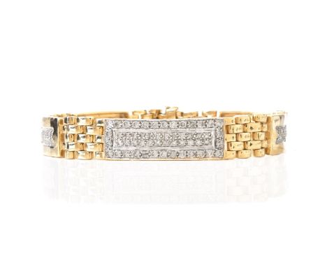 Man's Vintage Micro Pave Set Round Brilliant Cut Diamond and 14 Karat Yellow Gold Bracelet. Diamonds SI1-SI2 clarity. Stamped