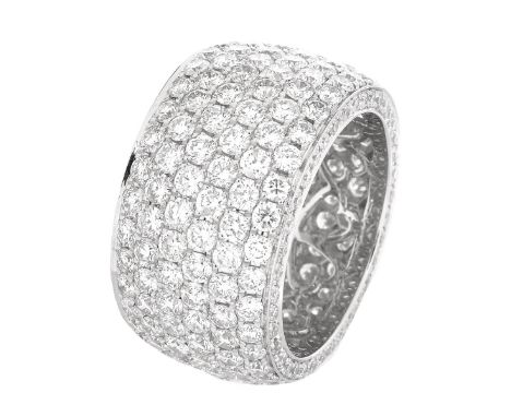 Cartier style 6.5 Carat Pave Set Round Brilliant Cut Diamond and 18 Karat White Gold Wide Eternity Band. Diamonds F-G color, 