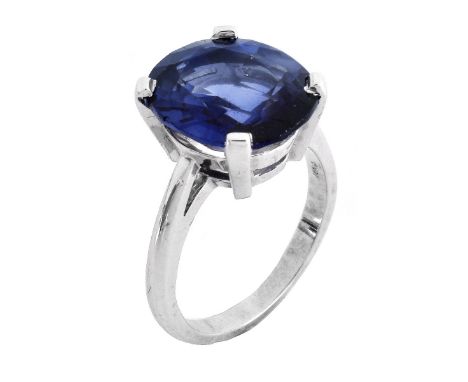 ASGL Certified 7.85 Cara Oval Cut Sri Lanka Sapphire and 14 Karat White Gold Ring. Sapphire with vivid blue color. Stamped 14