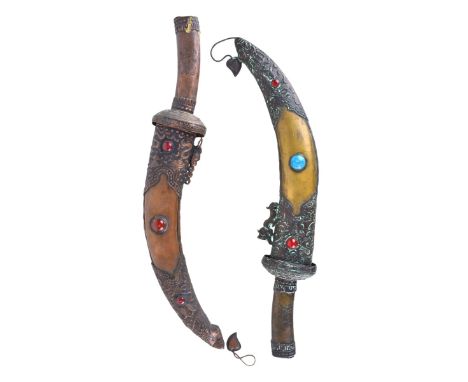 Two (2) Vintage Tibetan Inlaid Short Swords. Largest measures 21" L, other measures 19-1/2" L. Condition: light corrosion to 