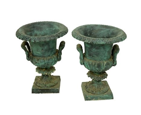 Pair Vintage Pottery Garden Urns. Iron like patina. Both with handles. Classic form. Unsigned. Measures 20-1/2" H. Condition: