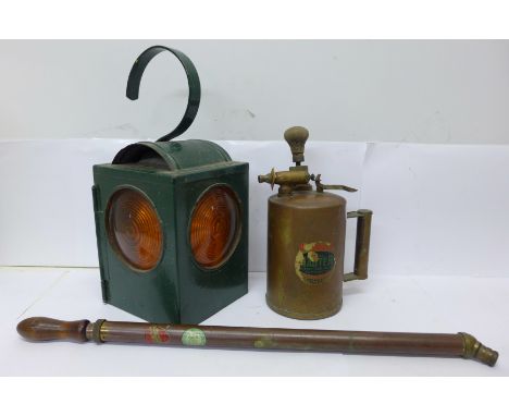 A brass pneumatic garden sprayer, a brass pump and a signal lamp 