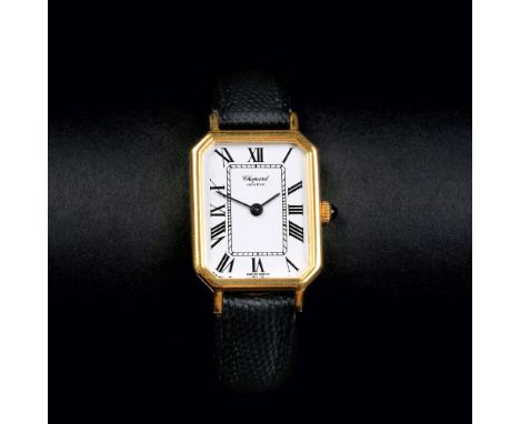 Chopard. Damen-Armbanduhr. 18 kt. GG, gest. Handaufzug. Oktogonales Gehäuse, weißes Zifferblatt, schwarze röm. Ziffern, Zentr