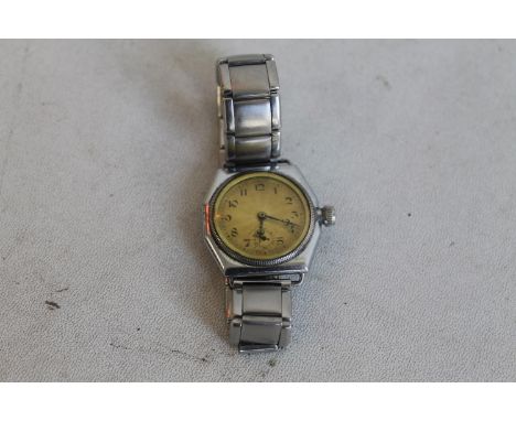 ROLEX AN EARLY GENTLEMAN'S OYSTER PRIMA, WITH CHROME PLATED CASE AND LARGE WINDING CROWN, Engine turned dial with Roman numer